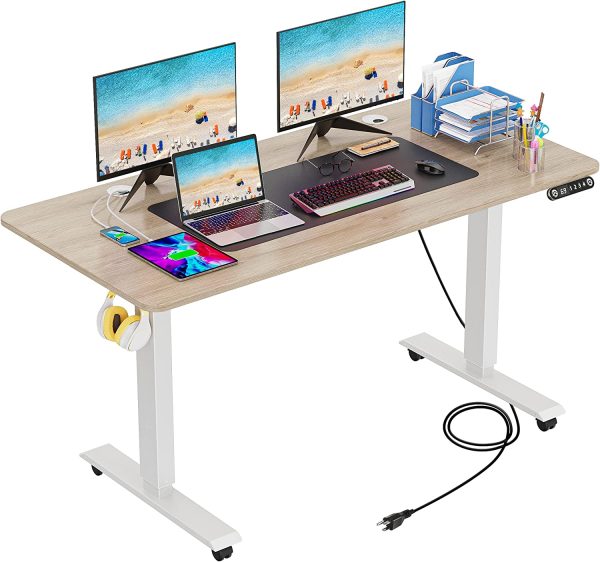 KORGOL Electric Standing Desk, Adjustable Height Stand Up Desk with Charging Station, 2 USB Ports, 3 Power Outlets, 4 Caster, Oversized Mouse Pad, 27  -45   Lifting Range(55   x 24  -Brown) Supply